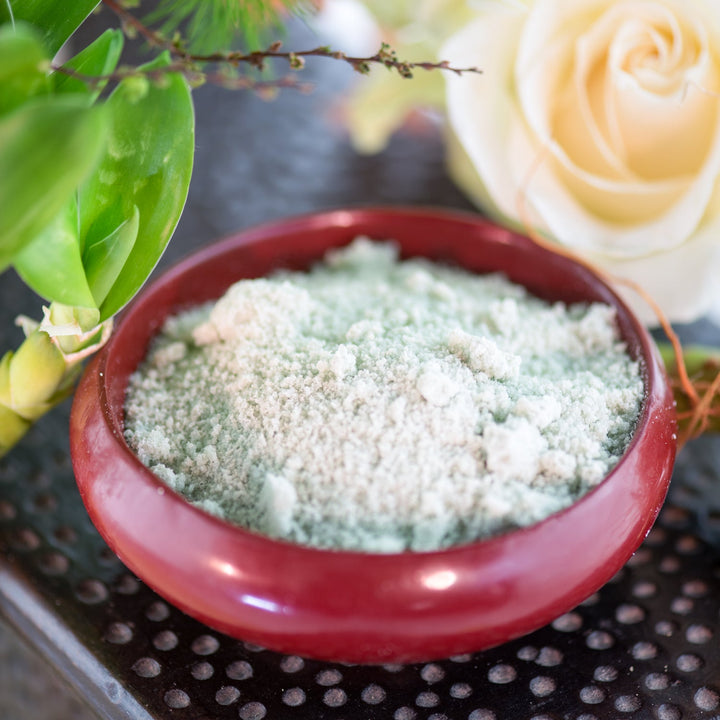 Red Flower Hinoki Mint mineral soak crystals in a Japanese-style ceramic bowl