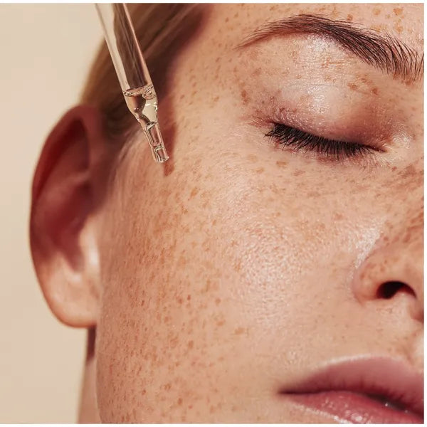 Skincare serum applied to skin